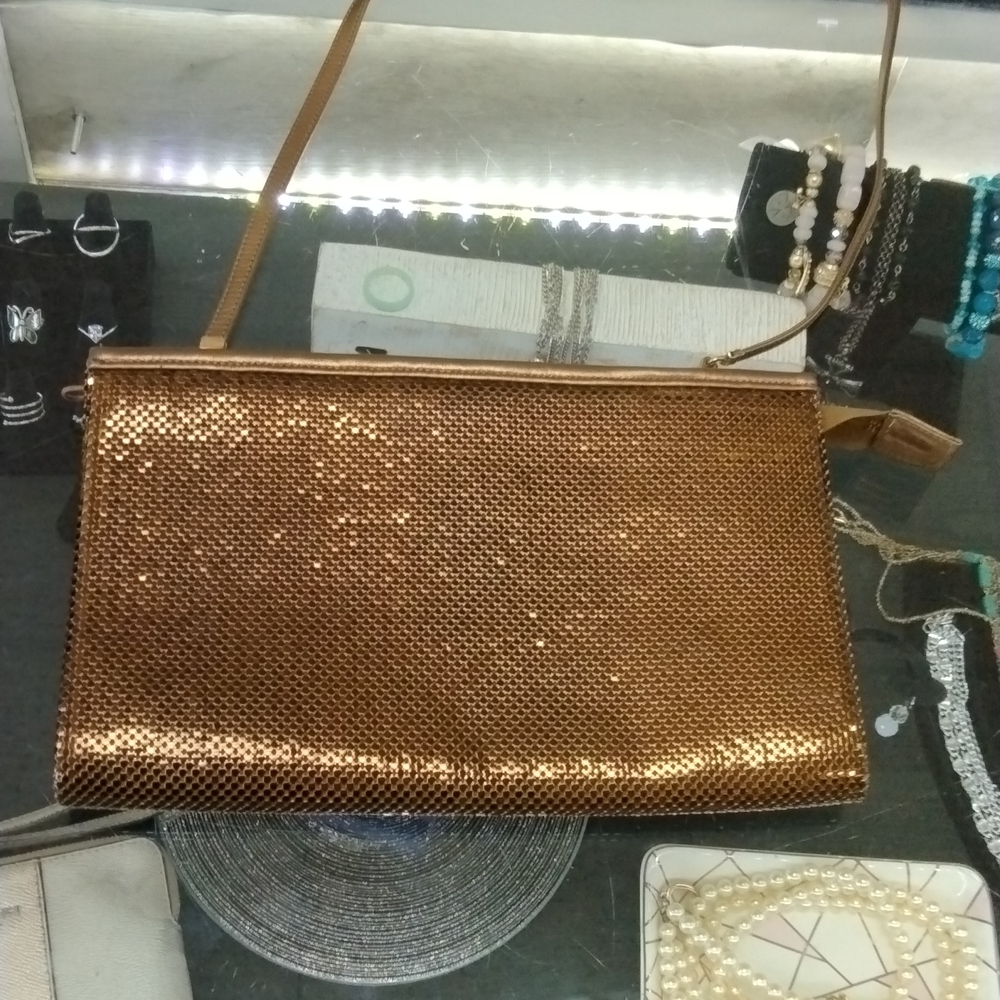 Whiting and Davis dark gold purse